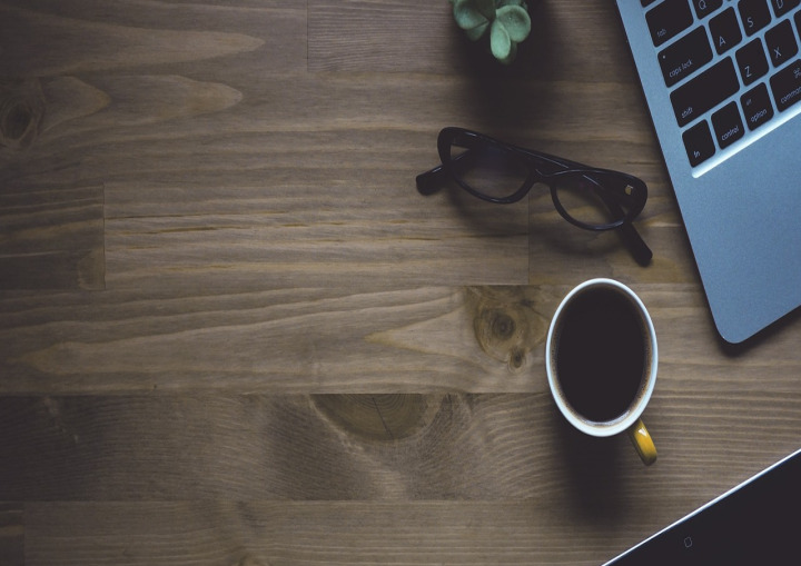 editor at work laptop coffee